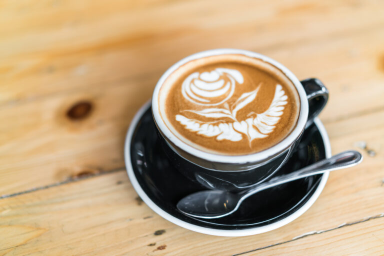 Latte Coffee art on the wooden table