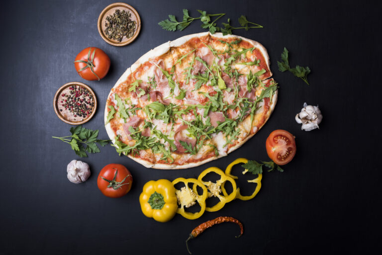 circular-frame-made-fresh-ingredients-around-delicious-italian-pizza-black-counter